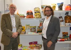 Willem de Jong with Volm Companies and Wim van der Meulen with Jasa Packaging. Jasa manufactures the sleeving machines. Several of Volm’s packaging options are shown in the background.